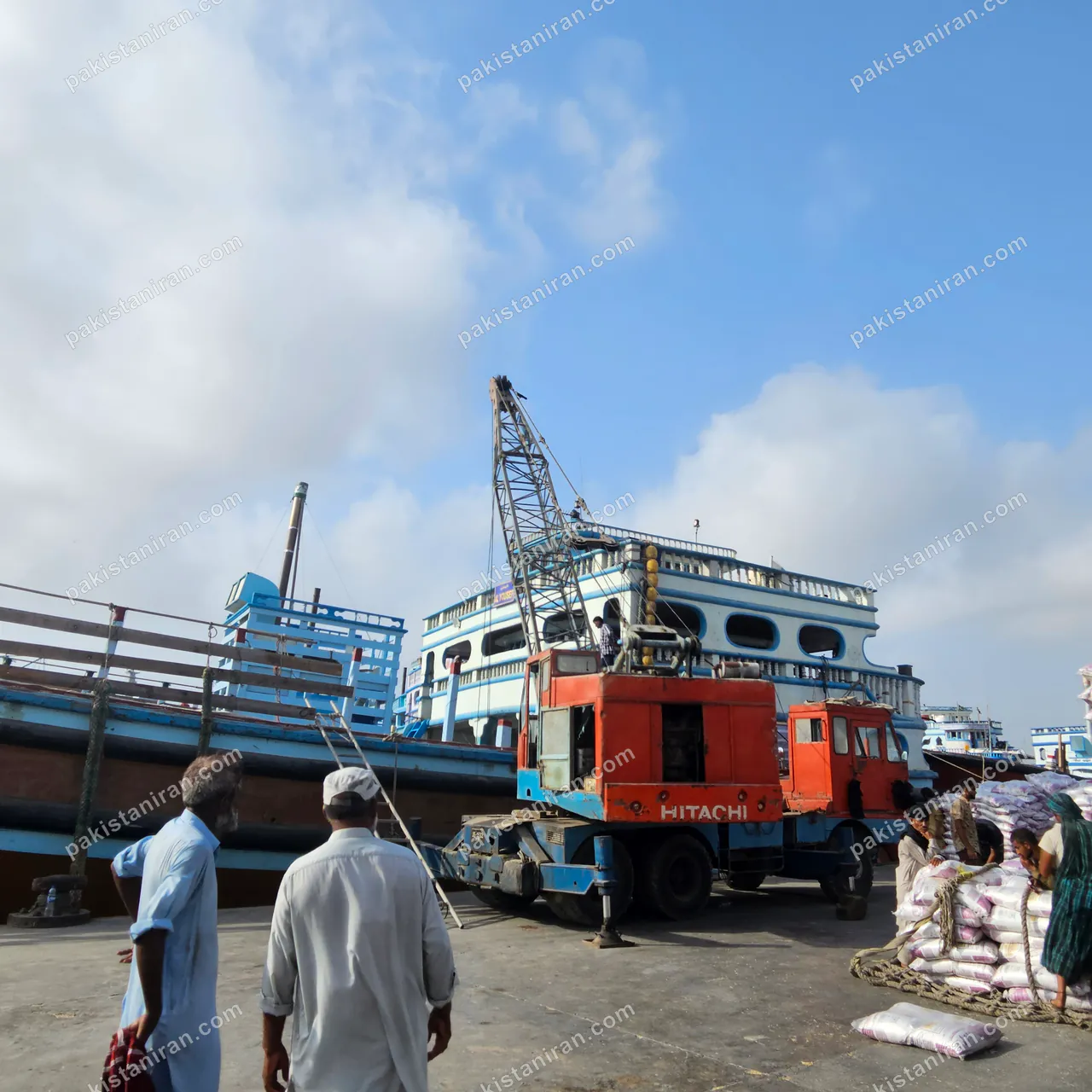 HAS Trading shipment: A dockside crane works alongside the launch during loading