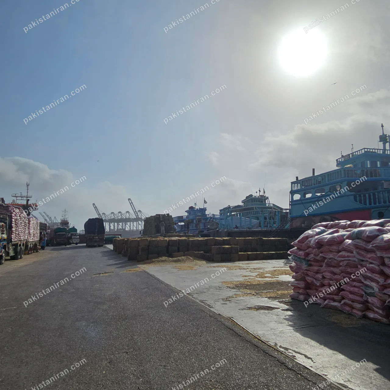 HAS Trading shipment: Morning on the Karachi wharf, rice staged beside the launches